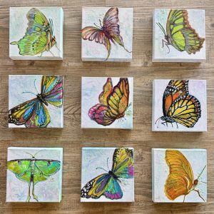 "Healing Series" Butterflies laid out on table. 8x8 inch canvas paintings.